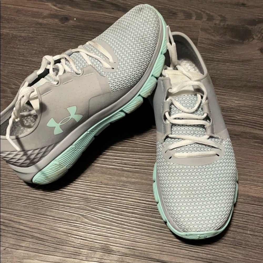 Grey and teal Under Armour shoes
